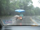 Thai motorbike with sidecar and raingear
