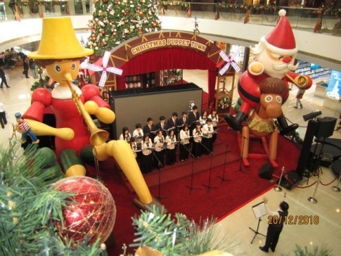 Chinese choir singing Christmas carols in the mall