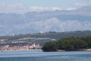 The Velebit Mountain Range is 40 kilometres and Bibinje is the village you can see on the beach in the foreground is 9 kilometres from our anchorage at Luka Zdrelac on the North end of Pasman Island Croatia