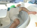 Fred mooning the crew; laid low by seasickness!