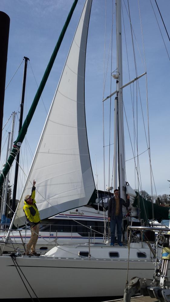 Checking out new staysail at the dock: Mark Downing & David Hernston