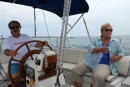 Vince at the wheel of his Goard Yacht on Lake Erie, Peaches enjoying it too