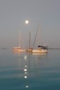 Moon setting in the morning at Staniel Cay anchorage