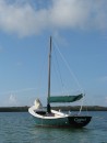 A local sailboat anchored off Manjack Cay