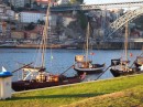 The river boats of the Port Houses on the banks of the river on the Vila Nova de Gaia