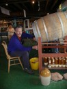 David filling a bottle from the cask