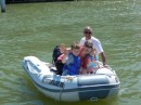 Grandpa, Janet and the kids going for a dinghy ride.