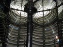 The Fresnel lenses. They have to be covered during the day because the magnify sunlight so much that they would set the lighthouse on fire.