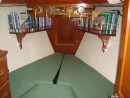 Final upholstery completed by Nichola, and books on shelves secured. Proper Job!
