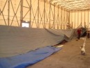 Setting up for shot blasting in the covered tent in the boat yard. a LOT of hassle