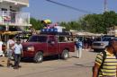 Loading the pickup trucks in Uribia