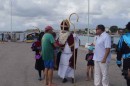 Sinterklaas has arrived in Bonaire and is greeted by the first child.