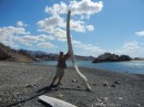 Our friend Paul lifting a whale bone on the beach.