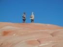 Ian and our friend Steve on top of a small rock that looks like a sand dune.