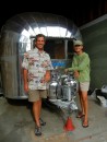Fred and Penny in front of their vintage Airstream RV.