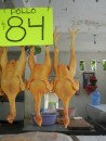 84 peso chickens - expensive but you do get the head and feet included!