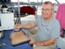 Here is dad cutting into his birthday cake. Can you believe he is 82!