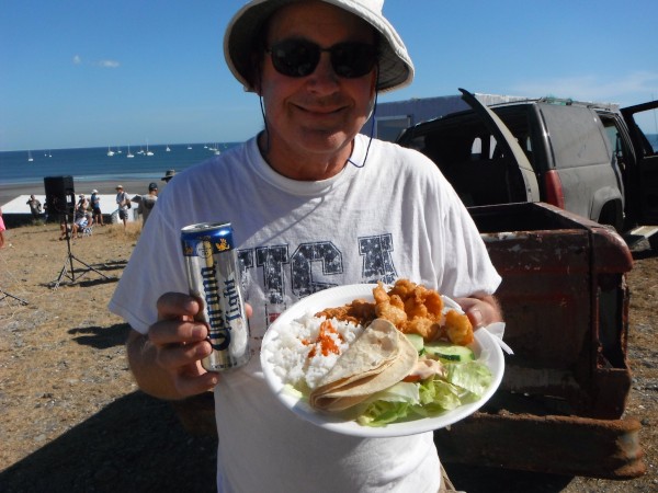 Brent with a plate of food prepared by the local fishermen at Bahia Santa Maria