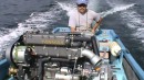 Jeff (Bocas mechanic) bringing our new Yanmar engine to the marina