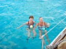 Normans Cay. Rena & Becky floating on noodles.