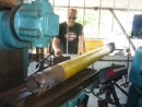 Setting up shaft ... they had to cut the window bars to get it on the milling machine