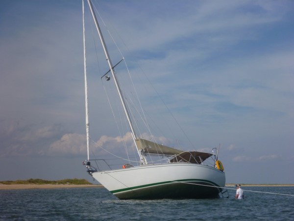 Beached yacht in Barden Inlet, North Carolina, USA