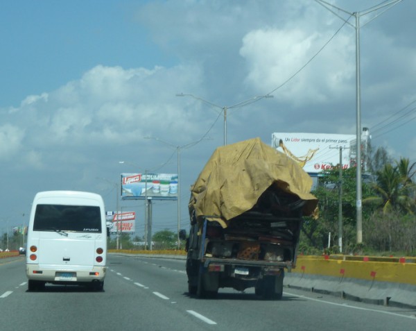 This truck has a bit of a lean on it from being so overloaded.