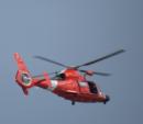 Coast guard helicopter making many passes over the marina today.