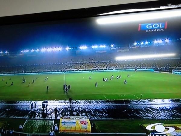 1/2 the soccer field was dark during the Colombia vs Ecuador soccer game at Barranquilla