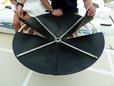 This shows the rubber flaps on the flopper stopper.  As the boat rolls, the flaps seal against the upward force of water which stops the roll of the boat
