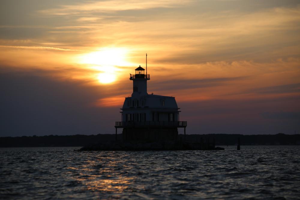 Sunset over Long Beach Bar Lighthouse, Orient, NY