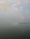 This rainbow formed a perfect entire circle with the sun shining through light rain and fog.  Our first circular rainbow, Smiths Cove, Castine, Maine