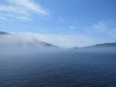 A ferry appearing out of the fog on the Saguenay Fjord, QC, Canada.