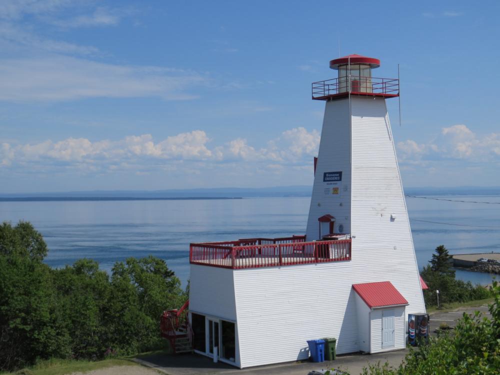 Lighthouse (now disused) at Saint Simeon built in 1906 overlooking St. Lawrence River, QC, Canada.