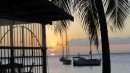 View of our boat (foreground) during sunset at anchorage in St. Pierre, Martinique