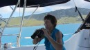 Mom looking for dolphins during passage from St. John to Megan