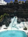 View of the pool from the steps leading to another volcanic bubble- room