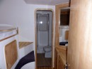 Starboard forward guest cabin look forward through en-suite head/shower.