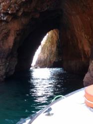 Boating through the island: One of the just navigable cave passages.