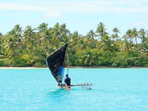 Outrigger under sail.