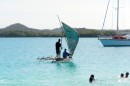 The outrigger heads back to the village.