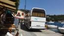 Local bus in Loggos, it squeezes along the quay!