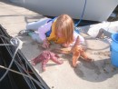 Jillian on the dock...playing with her starfish friends.