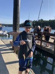 Ethan admiring his catch, Montague Harbour