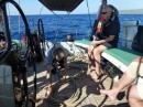 Joyce learns the special art of halyard coiling