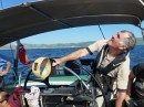 Dad checks the main sail trim!