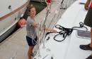 Cassie throws a line on deck