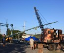 Lifting the mast of the transport truck after delivery form Oswego.