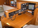 Navigation station: VHF Radio, electrical panel and radar.