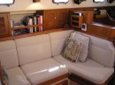 Starboard side main salon.  Marjorie has made colorful slip covers for all cushions.  New pix to be posted later this year.